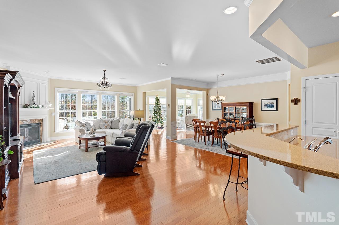 113 Beckingham Loop Cary, NC 27519 - Photo 19 of 46 a living room with furniture and a flat screen tv