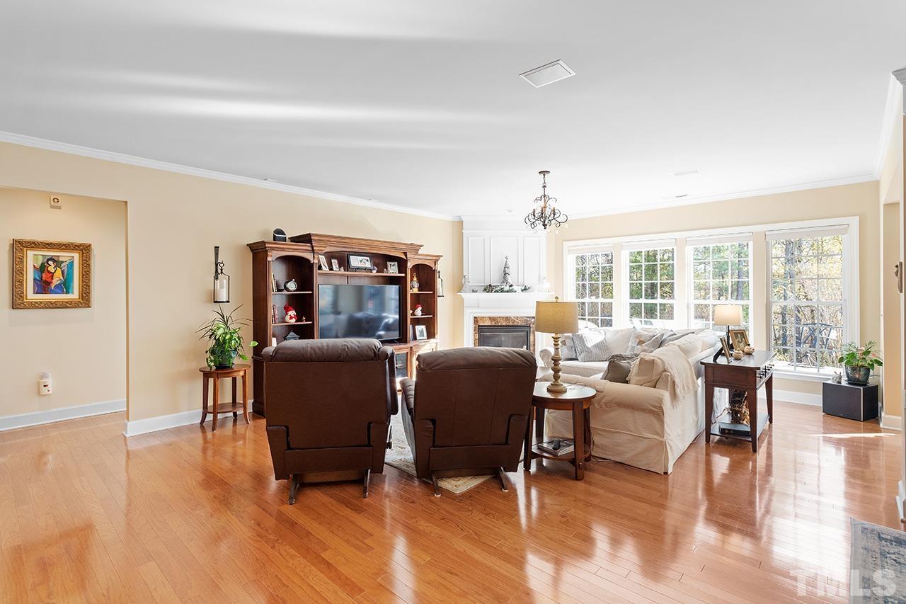 113 Beckingham Loop Cary, NC 27519 - Photo 20 of 46 a living room with furniture and a large window
