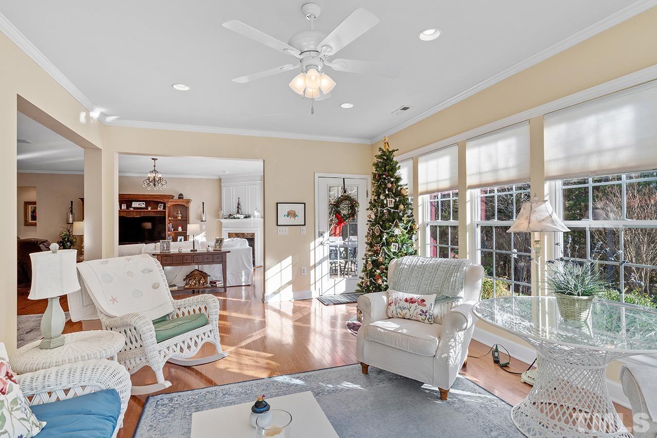 113 Beckingham Loop Cary, NC 27519 - Photo 24 of 46 a living room with furniture and a large window