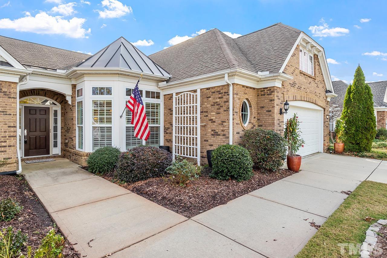 113 Beckingham Loop Cary, NC 27519 - Photo 3 of 46 a front view of a house with garden