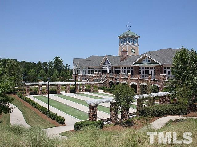 113 Beckingham Loop Cary, NC 27519 - Photo 36 of 46 a front view of a house with a yard