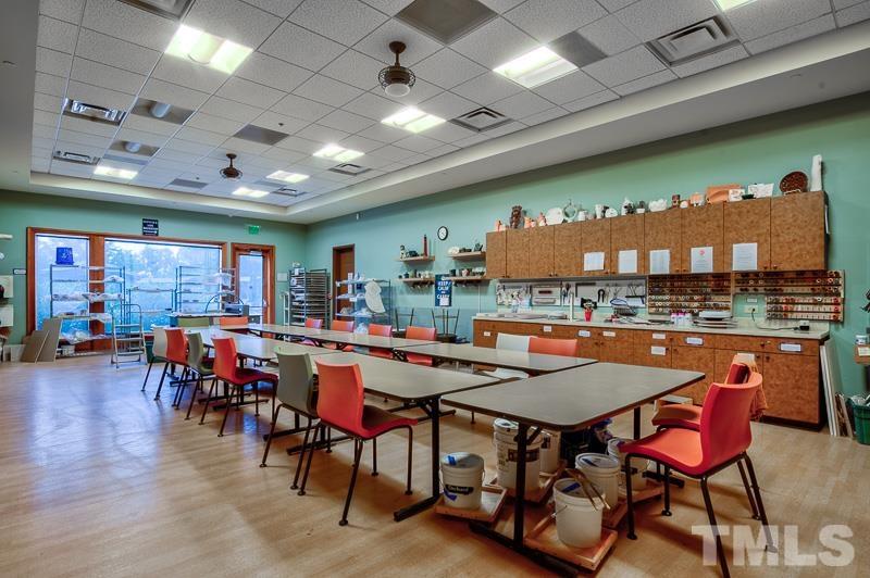 113 Beckingham Loop Cary, NC 27519 - Photo 43 of 46 a view of a dining room with furniture and wooden floor