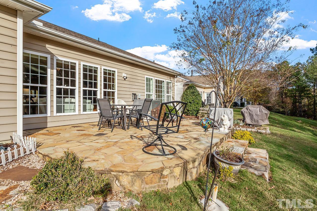 113 Beckingham Loop Cary, NC 27519 - Photo 5 of 46 a view of a swimming pool with chairs