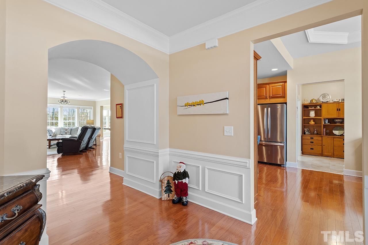 113 Beckingham Loop Cary, NC 27519 - Photo 8 of 46 a living room with furniture and a wooden floor