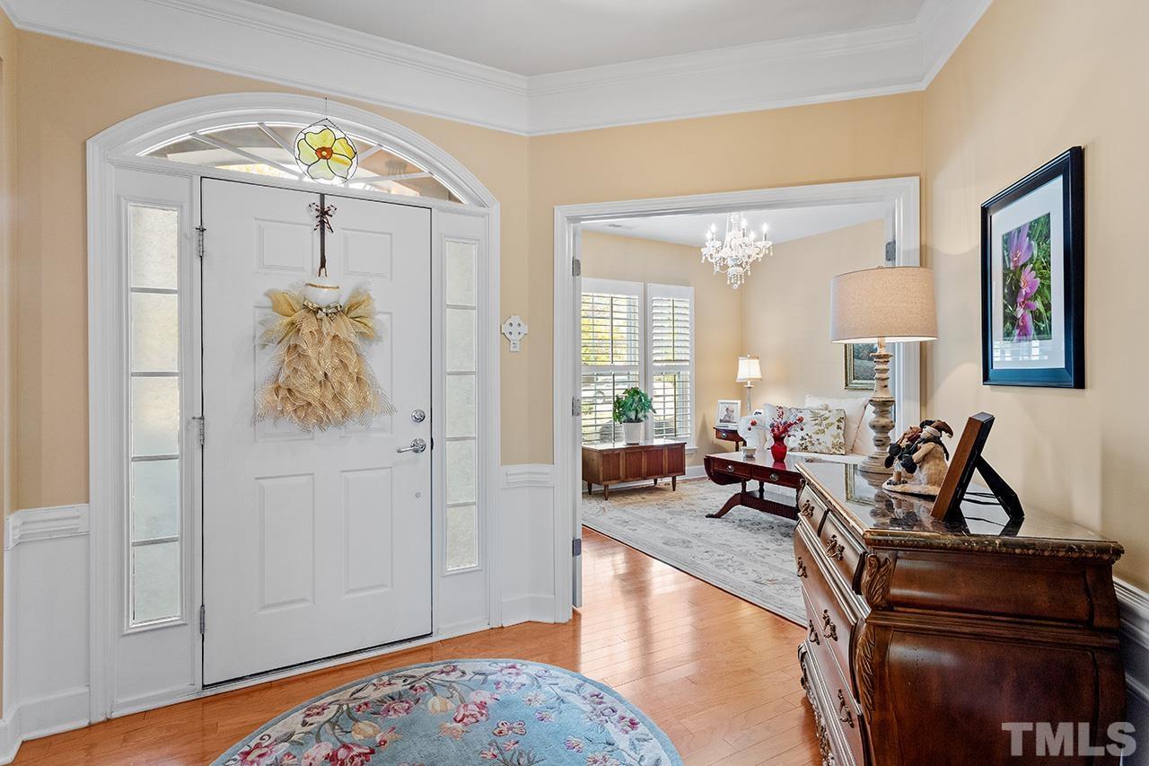 113 Beckingham Loop Cary, NC 27519 - Photo 9 of 46 a living room with furniture and wooden floor