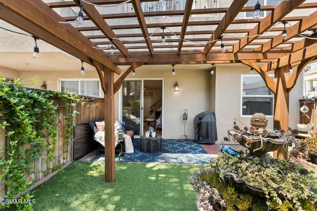 a view of yard with patio