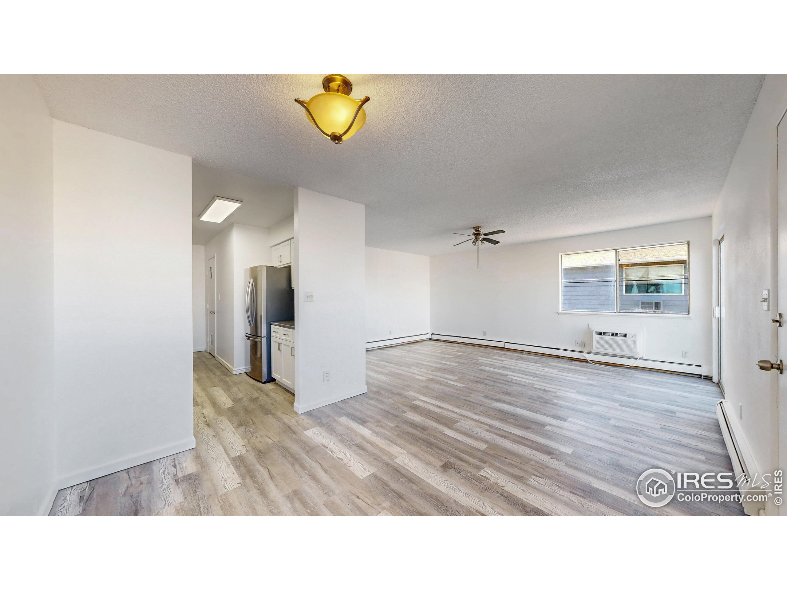 6975 Mariposa Street Denver, CO 80221 - Photo 12 of 34 a bathroom with a sink and mirror