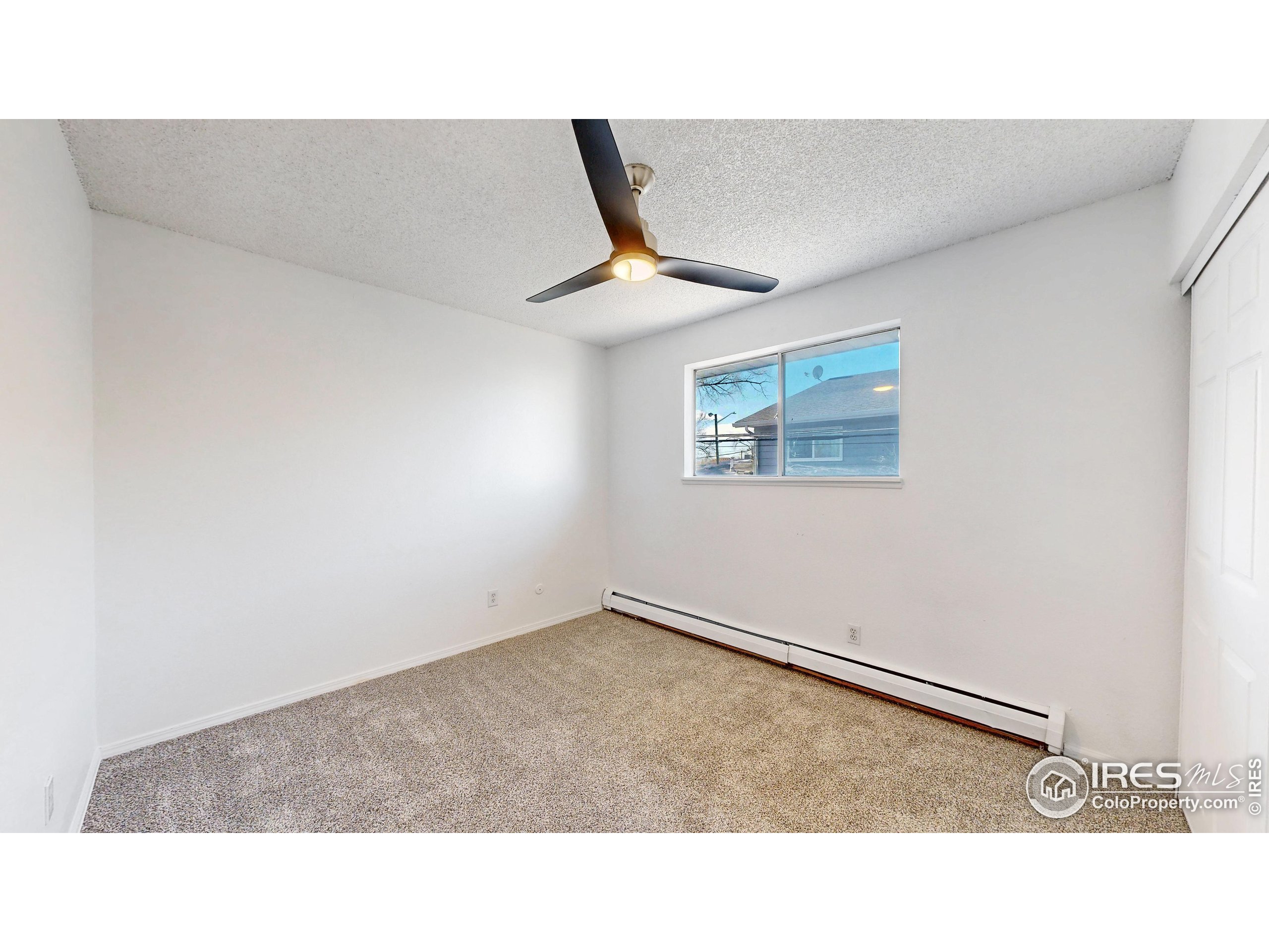 6975 Mariposa Street Denver, CO 80221 - Photo 21 of 34 a black and white photo of a living room