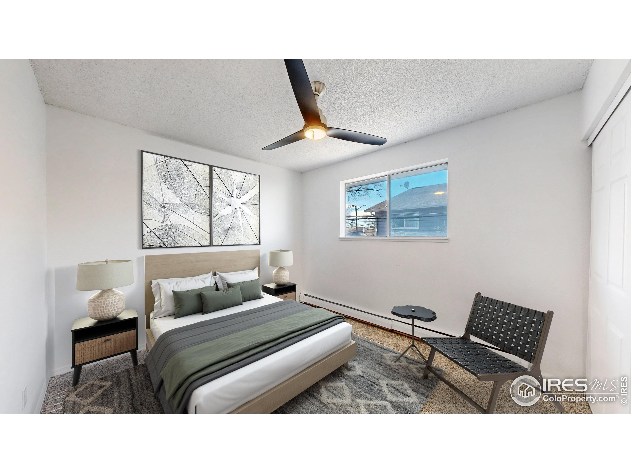 6975 Mariposa Street Denver, CO 80221 - Photo 22 of 34 a living room with furniture and a window