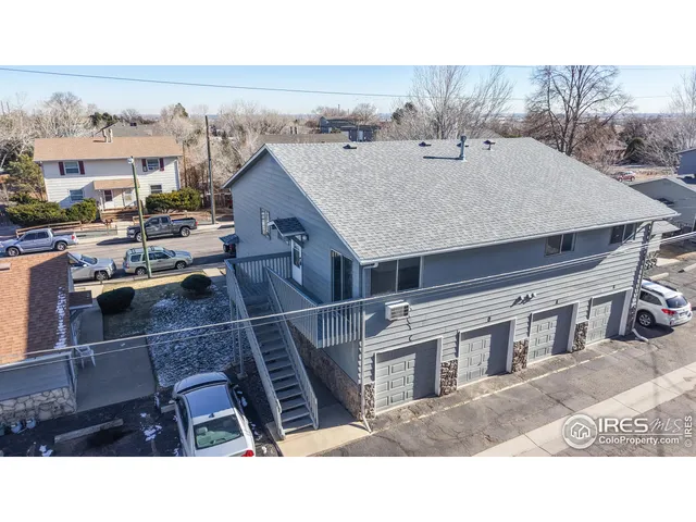 a black and white photo of a house