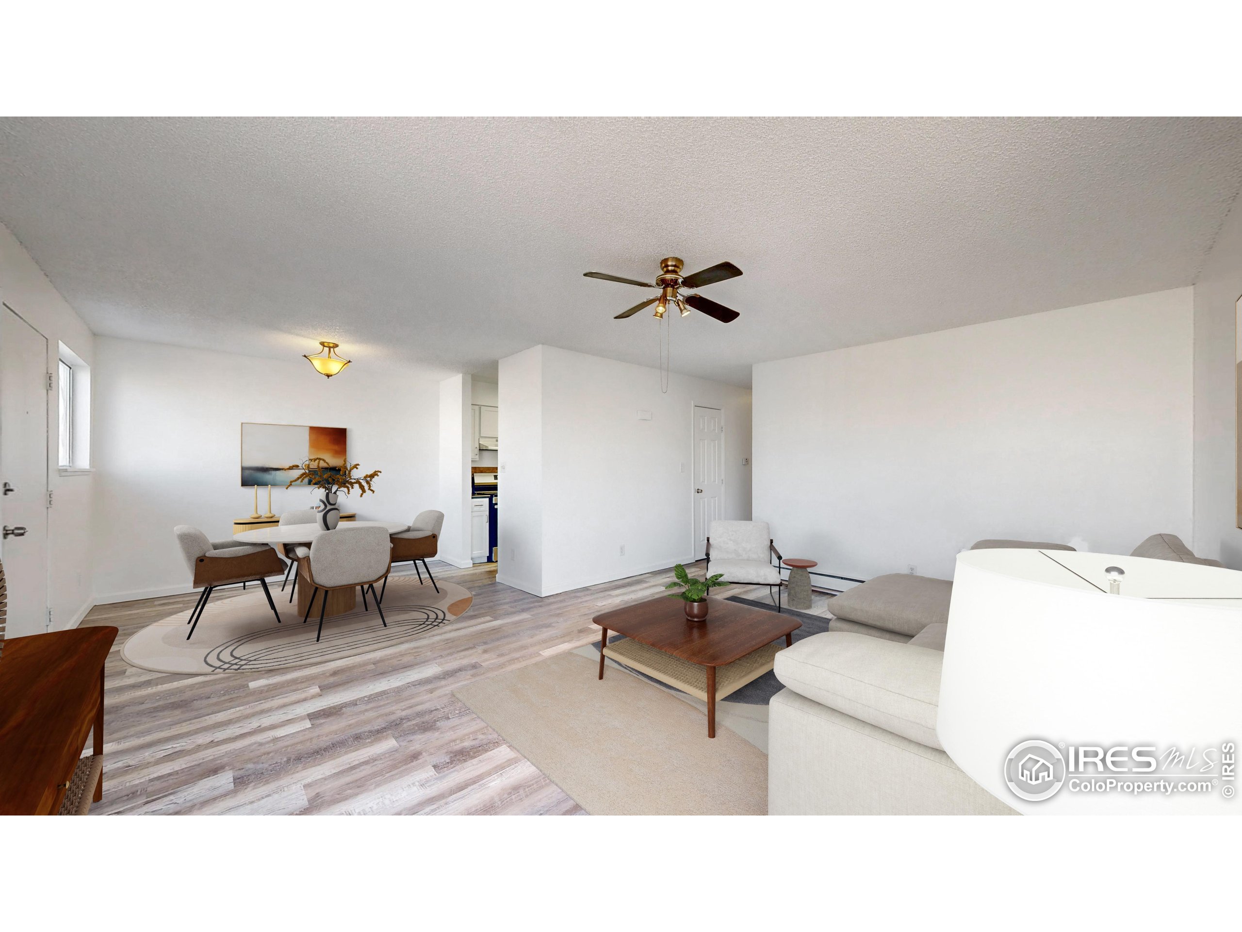 6975 Mariposa Street Denver, CO 80221 - Photo 5 of 34 a living room with furniture and a couch
