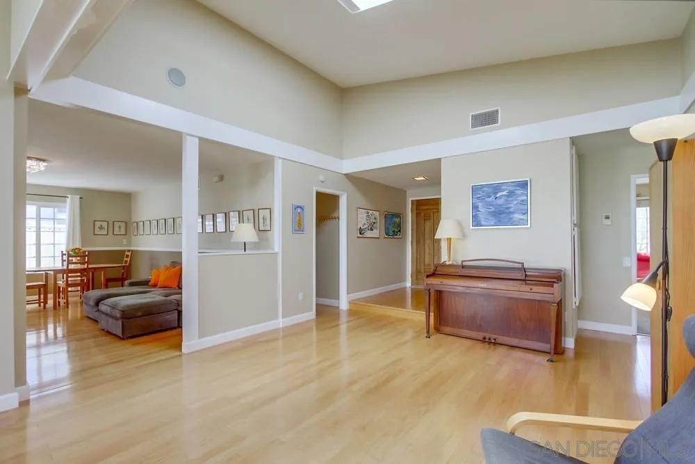 13202 Lingre Avenue Poway, CA 92064 - Photo 13 of 71 a living room with furniture and a flat screen tv