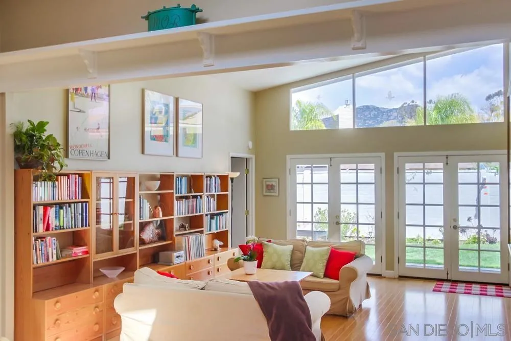 13202 Lingre Avenue Poway, CA 92064 - Photo 16 of 71 a bedroom with large window and a bed