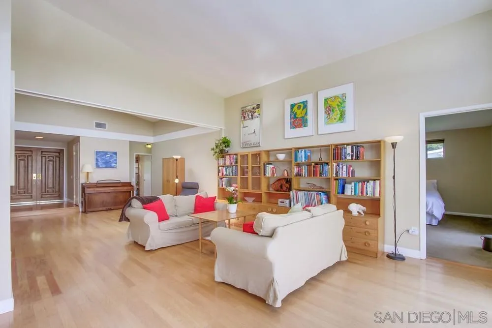 13202 Lingre Avenue Poway, CA 92064 - Photo 18 of 71 a living room with furniture and white walls