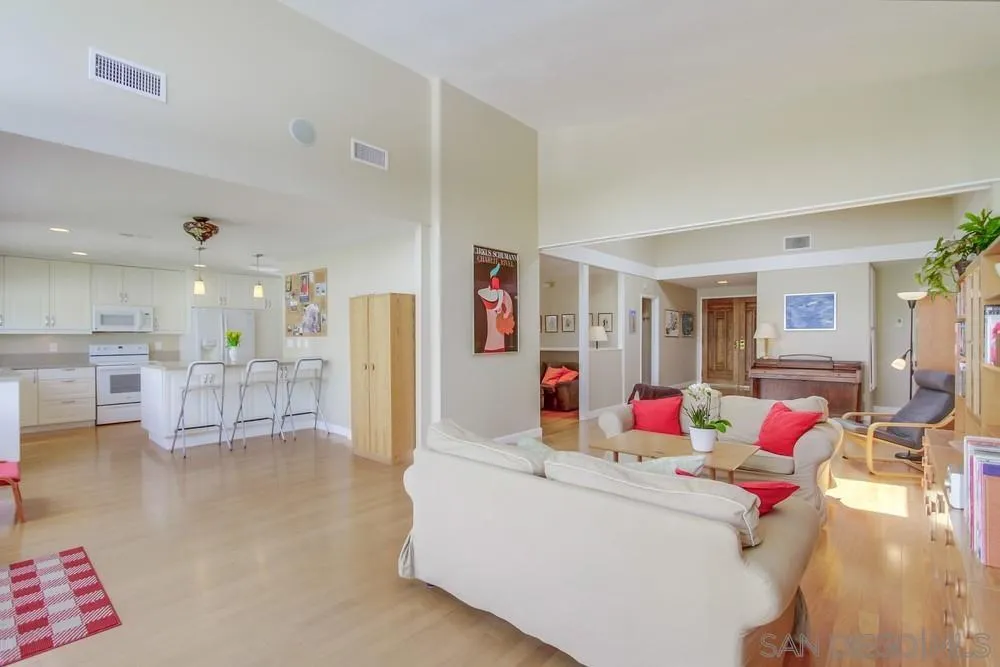 13202 Lingre Avenue Poway, CA 92064 - Photo 19 of 71 a living room with furniture and a wooden floor