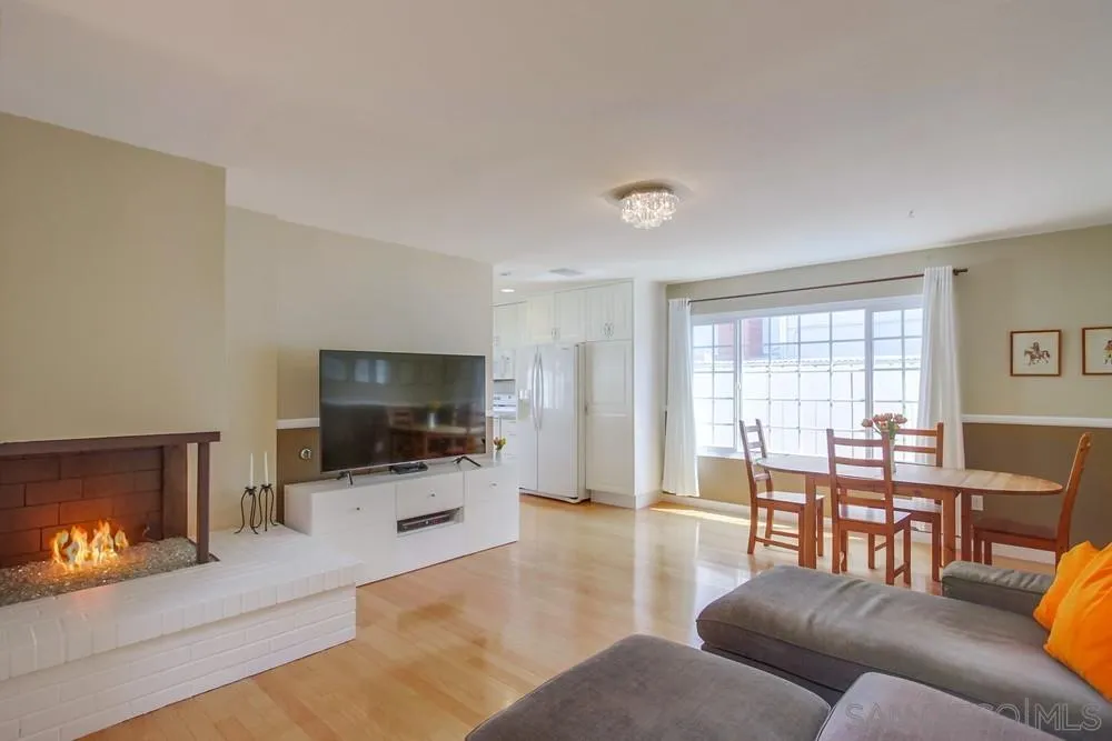 13202 Lingre Avenue Poway, CA 92064 - Photo 22 of 71 a living room with furniture and a flat screen tv