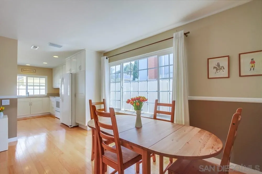 13202 Lingre Avenue Poway, CA 92064 - Photo 24 of 71 a view of a dining room with furniture and wooden floor