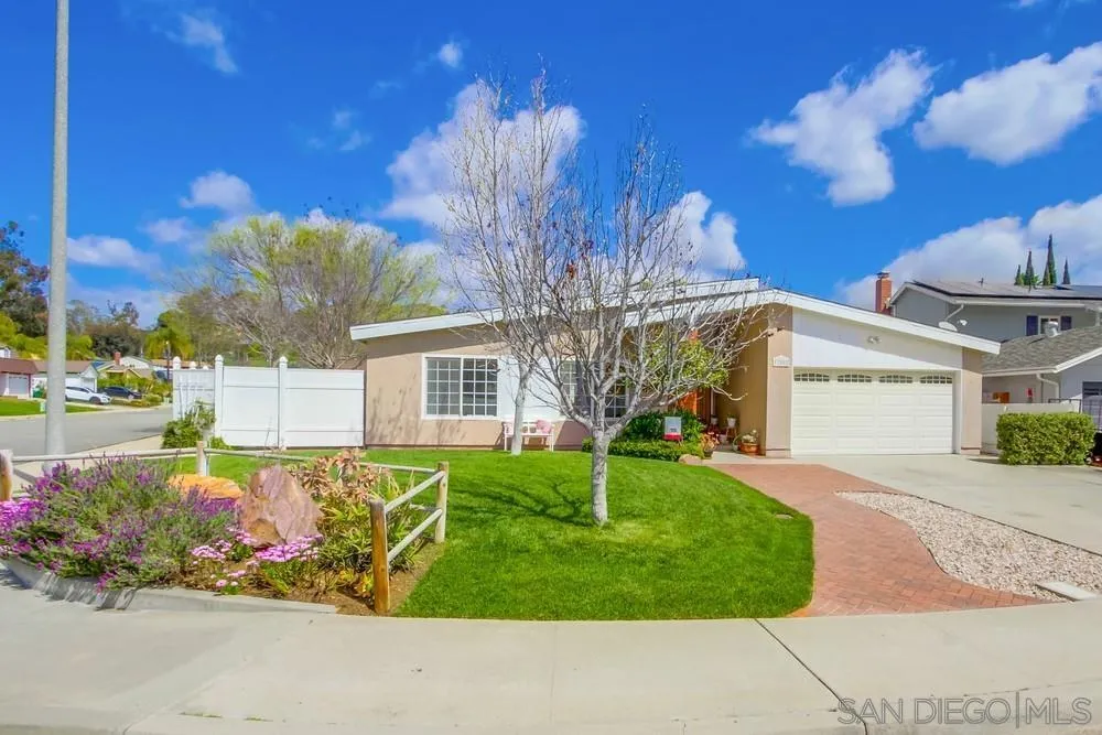 13202 Lingre Avenue Poway, CA 92064 - Photo 3 of 71 a front view of a house with garden