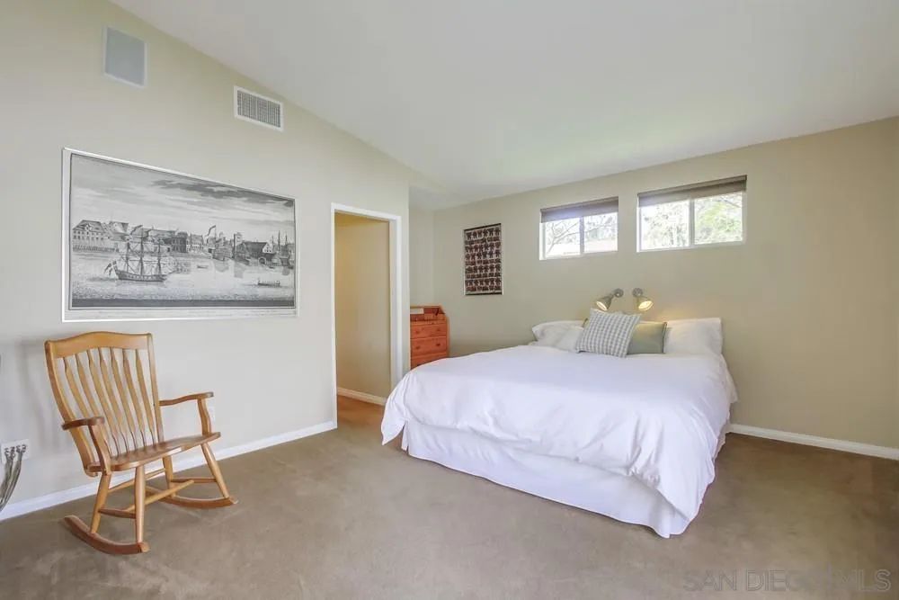 13202 Lingre Avenue Poway, CA 92064 - Photo 37 of 71 a bedroom with a bed and chair