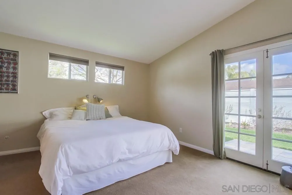 13202 Lingre Avenue Poway, CA 92064 - Photo 39 of 71 a bedroom with a bed and a window