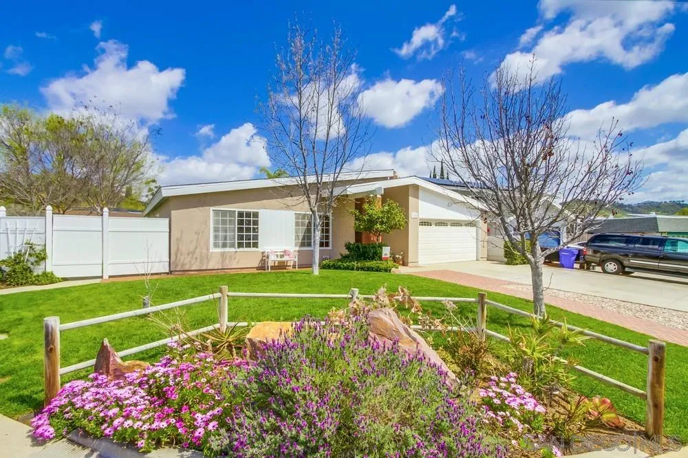 13202 Lingre Avenue Poway, CA 92064 - Photo 4 of 71 a view of a house with a big yard and potted plants
