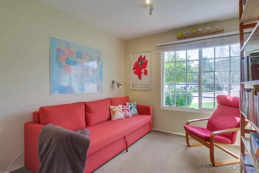 13202 Lingre Avenue Poway, CA 92064 - Photo 50 of 71 a living room with furniture and a large window