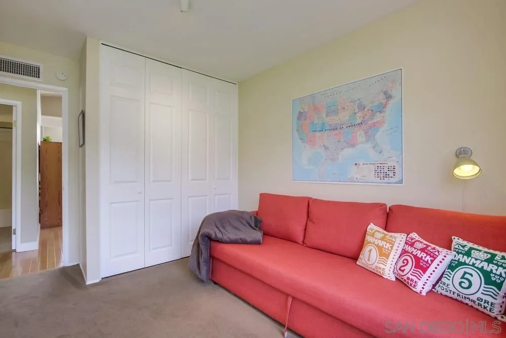 13202 Lingre Avenue Poway, CA 92064 - Photo 52 of 71 a blue couch sitting in a living room with a couch