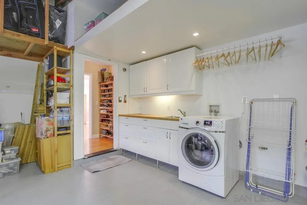 13202 Lingre Avenue Poway, CA 92064 - Photo 59 of 71 a utility room with dryer and washer