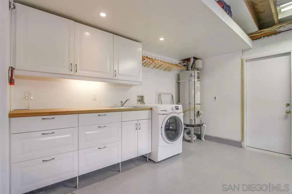13202 Lingre Avenue Poway, CA 92064 - Photo 60 of 71 a utility room with dryer and washer