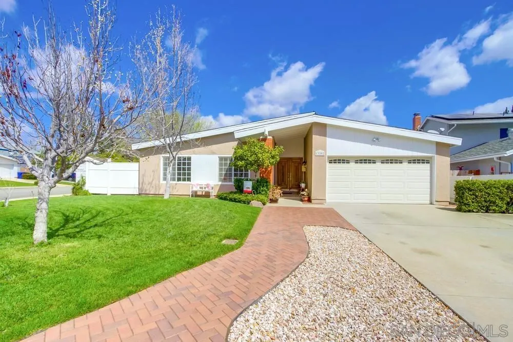 13202 Lingre Avenue Poway, CA 92064 - Photo 6 of 71 a view of a house with a garden