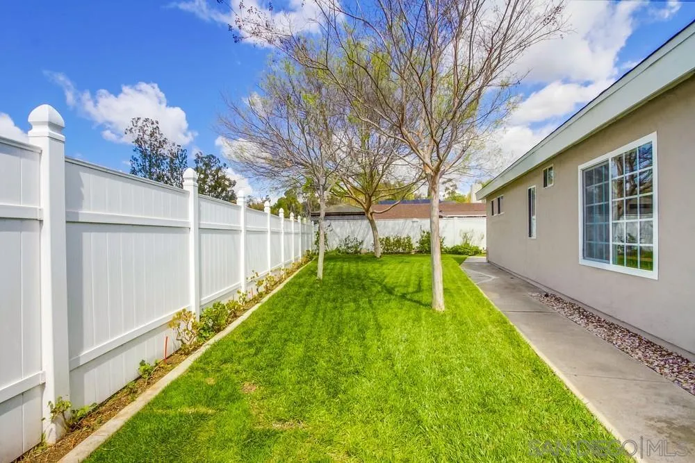 13202 Lingre Avenue Poway, CA 92064 - Photo 67 of 71 a view of a backyard with a large tree