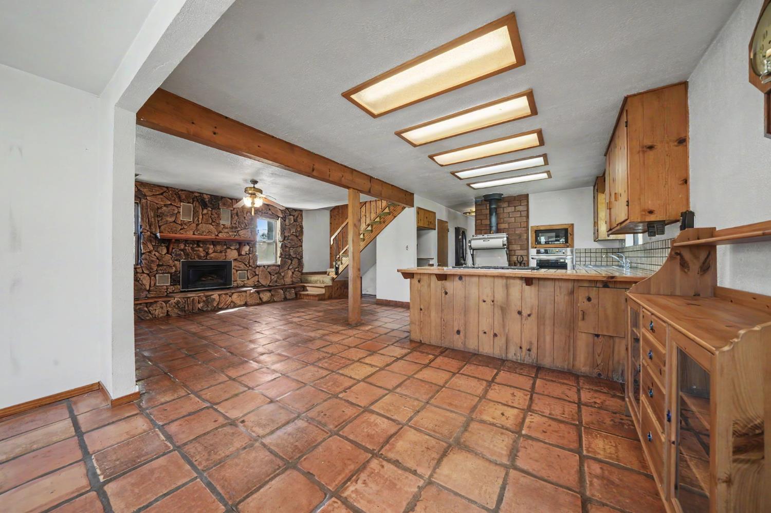 17800 Red Mule Road Fiddletown, CA 95629 - Photo 15 of 74 a view of a kitchen with furniture and a kitchen