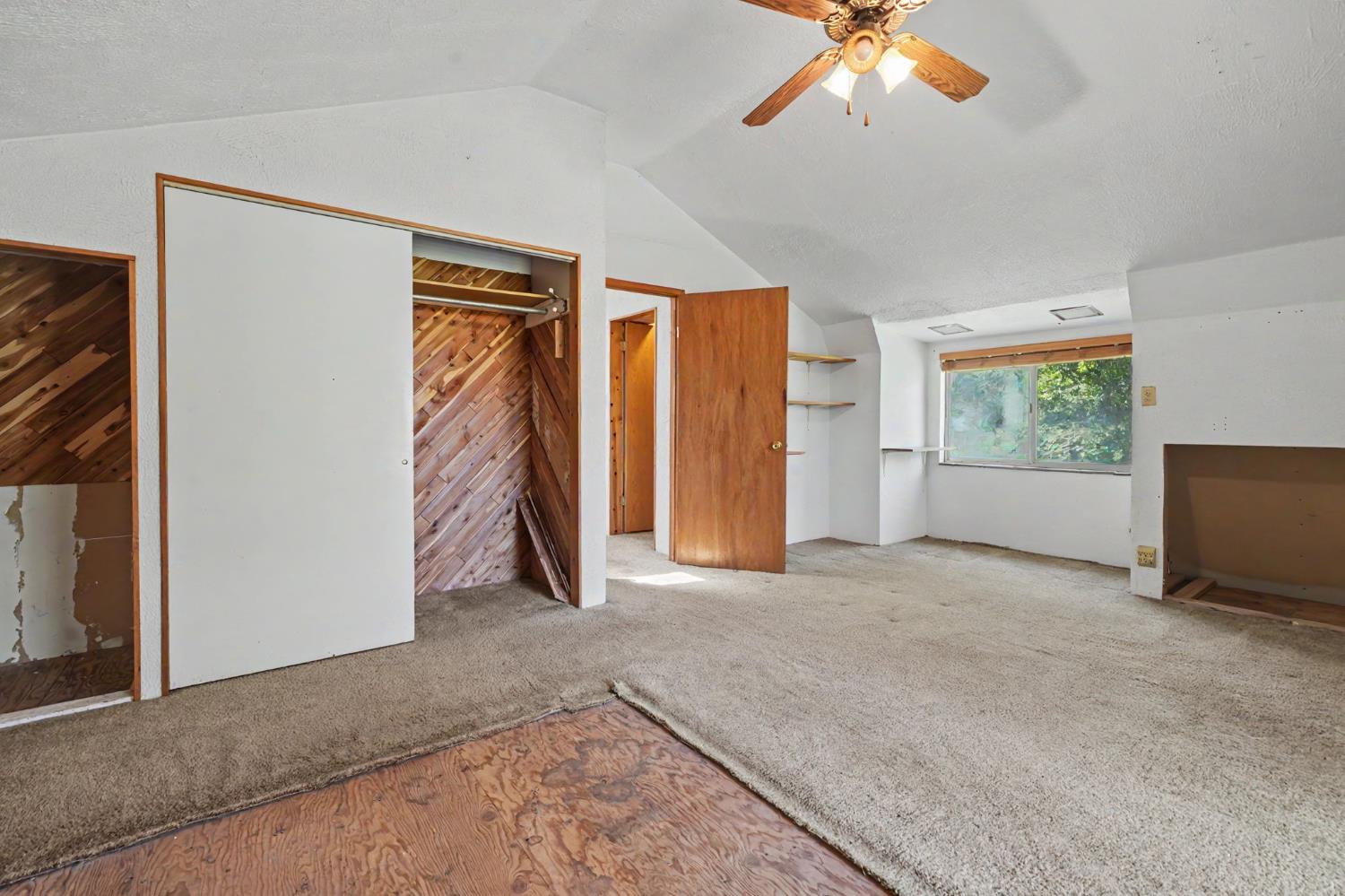 17800 Red Mule Road Fiddletown, CA 95629 - Photo 29 of 74 a view of a livingroom with an empty space and a window