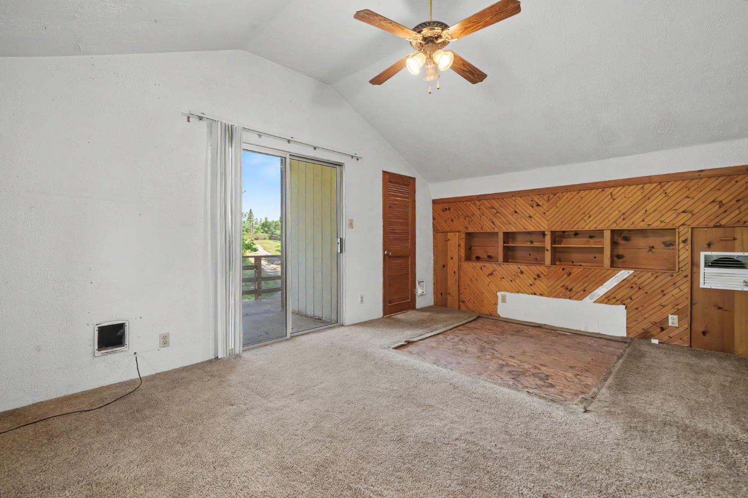 17800 Red Mule Road Fiddletown, CA 95629 - Photo 30 of 74 an empty room with fan and windows