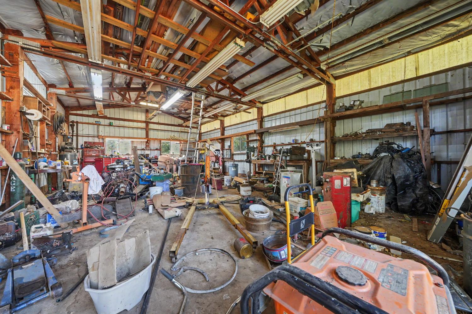 17800 Red Mule Road Fiddletown, CA 95629 - Photo 36 of 74 a view of a storage room with a lot of stuff