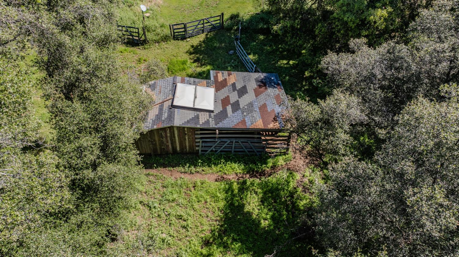 17800 Red Mule Road Fiddletown, CA 95629 - Photo 37 of 74 an aerial view of a house with large trees