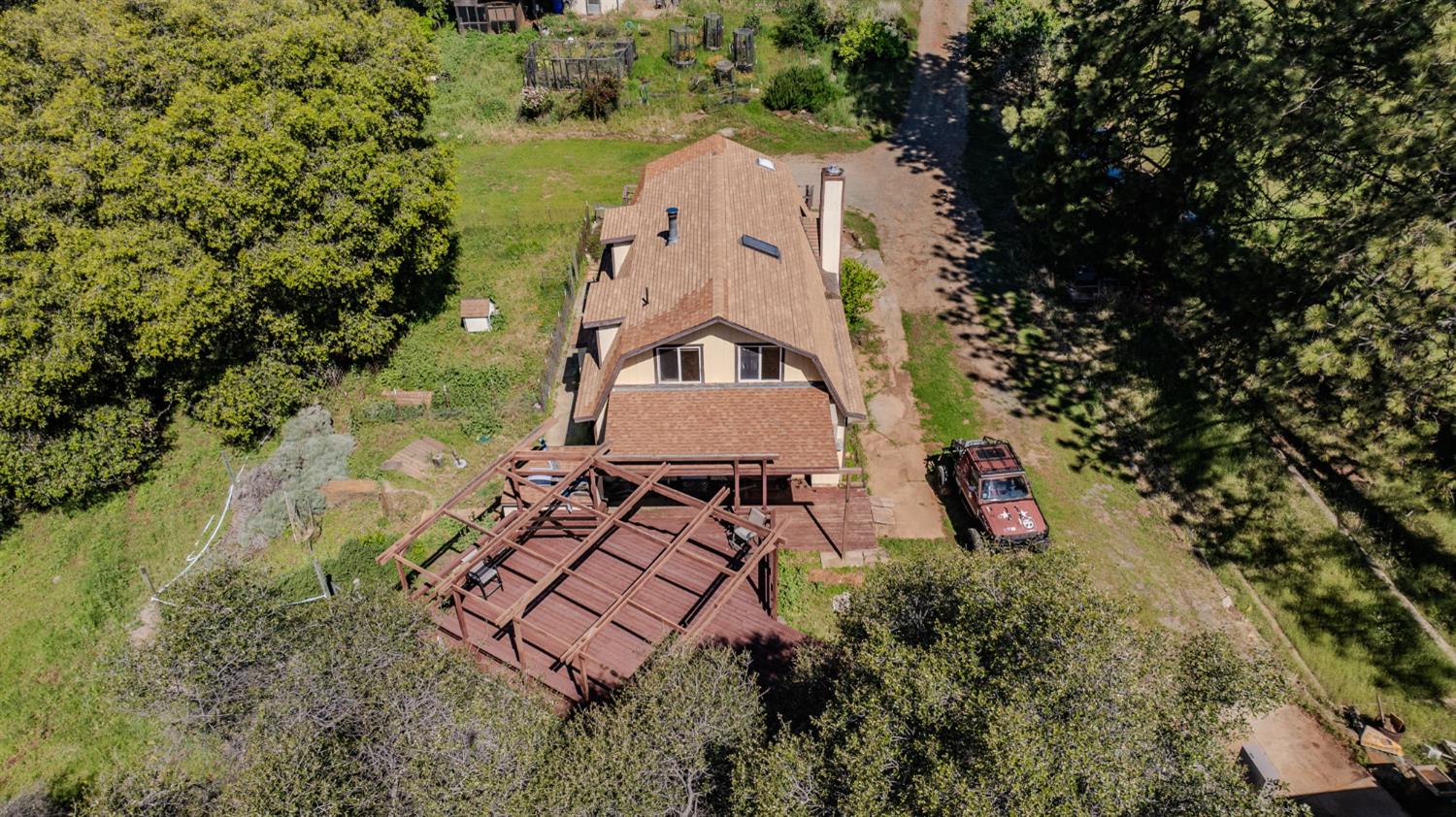 17800 Red Mule Road Fiddletown, CA 95629 - Photo 45 of 74 an aerial view of a house with a yard and lake view