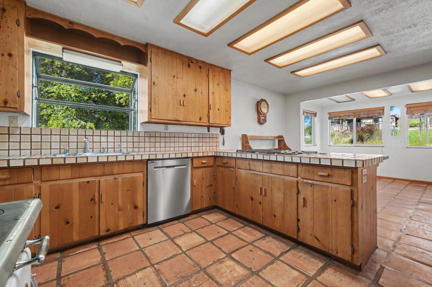 17800 Red Mule Road Fiddletown, CA 95629 - Photo 6 of 74 a kitchen with granite countertop a sink stainless steel appliances and cabinets