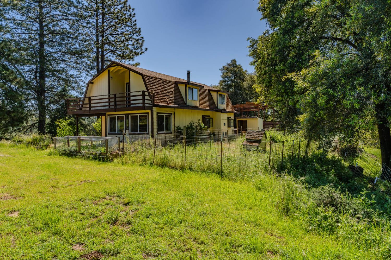 17800 Red Mule Road Fiddletown, CA 95629 - Photo 66 of 74 a view of a house with a yard