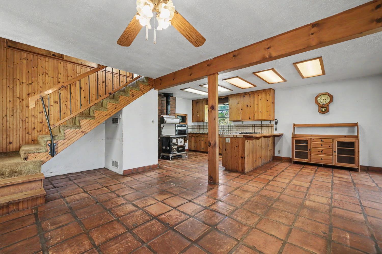 17800 Red Mule Road Fiddletown, CA 95629 - Photo 10 of 74 a view of a livingroom with kitchen and furniture