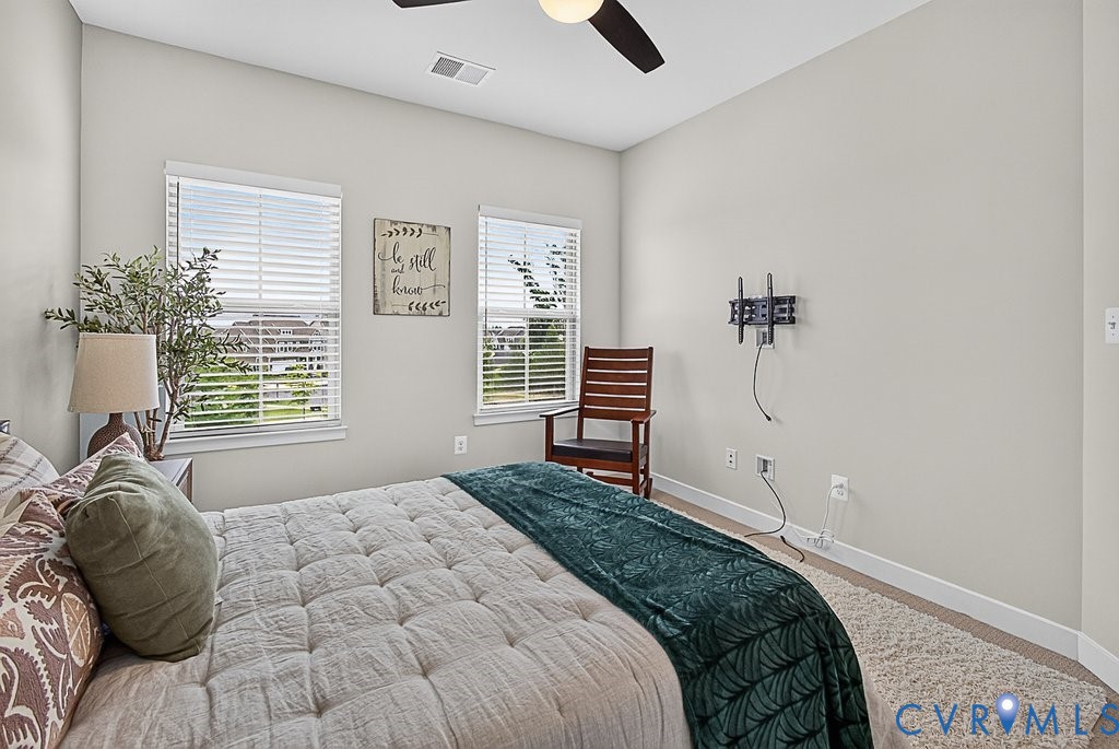 17976 Spotted Oak Road Dumfries, VA 22026 - Photo 27 of 52 Guest Bedroom featuring two windows with horizonta