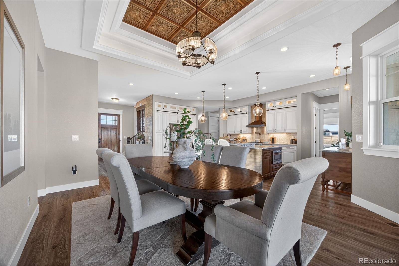 3444 Antelope Ridge Trail Parker, CO 80138 - Photo 17 of 50 a dining room with furniture and window