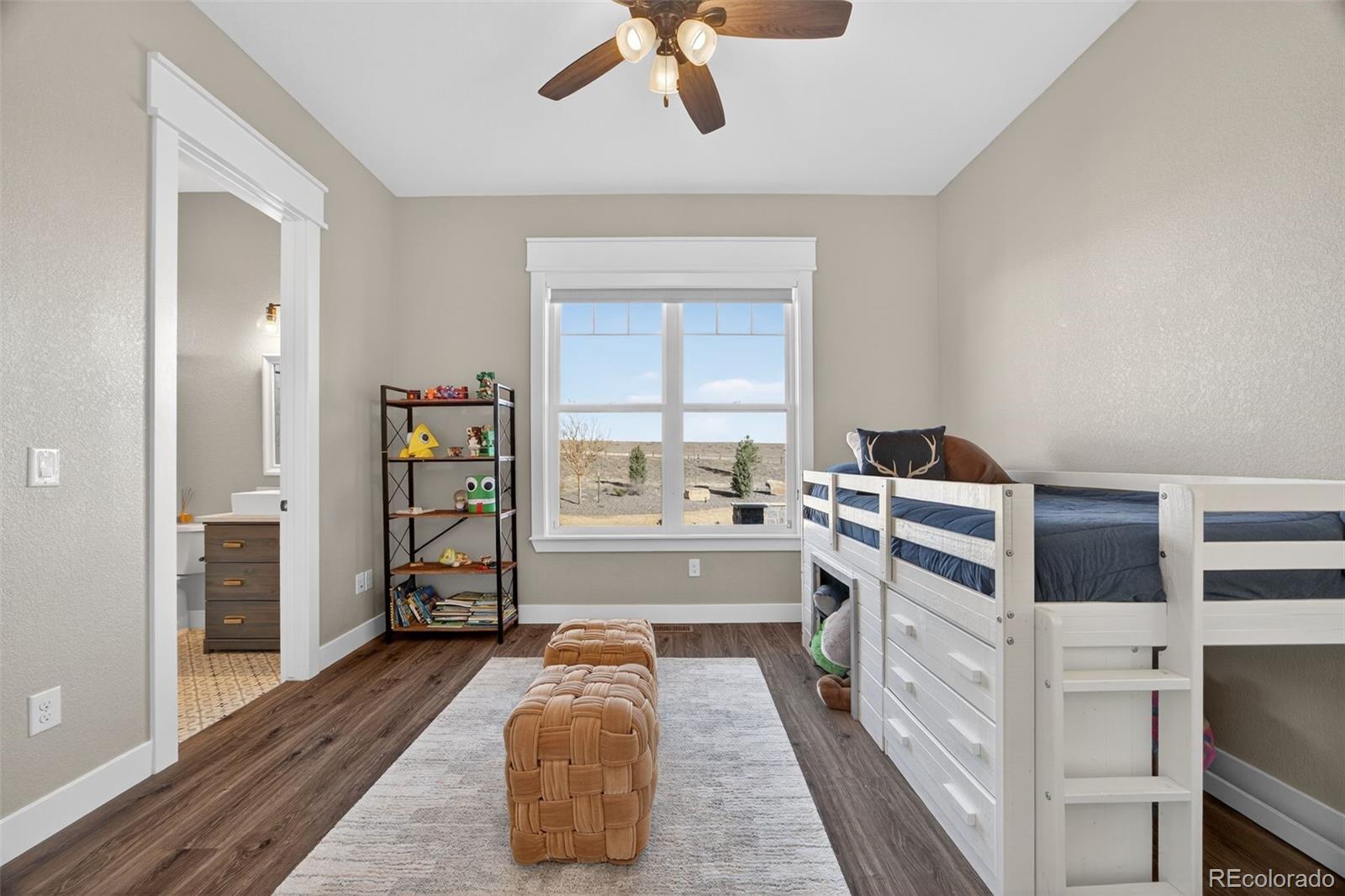 3444 Antelope Ridge Trail Parker, CO 80138 - Photo 24 of 50 a kitchen with stainless steel appliances granite countertop a stove and a refrigerator