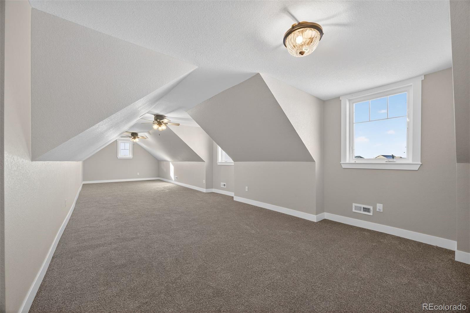 3444 Antelope Ridge Trail Parker, CO 80138 - Photo 28 of 50 a view of an empty room with a window
