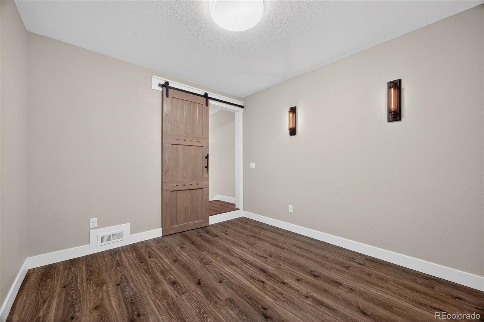 3444 Antelope Ridge Trail Parker, CO 80138 - Photo 29 of 50 wooden floor in an empty room