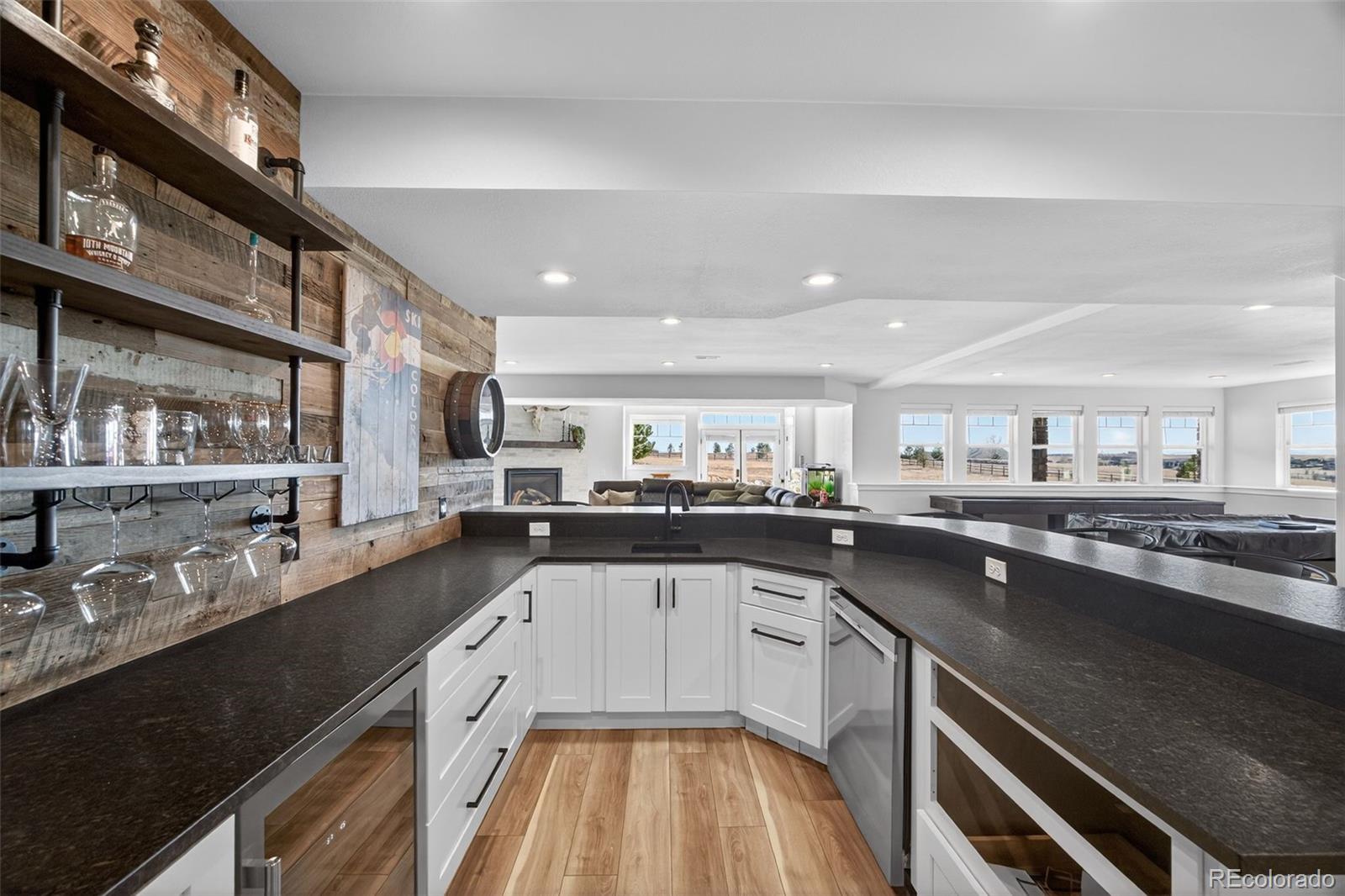 3444 Antelope Ridge Trail Parker, CO 80138 - Photo 33 of 50 a kitchen with lots of counter space and appliances