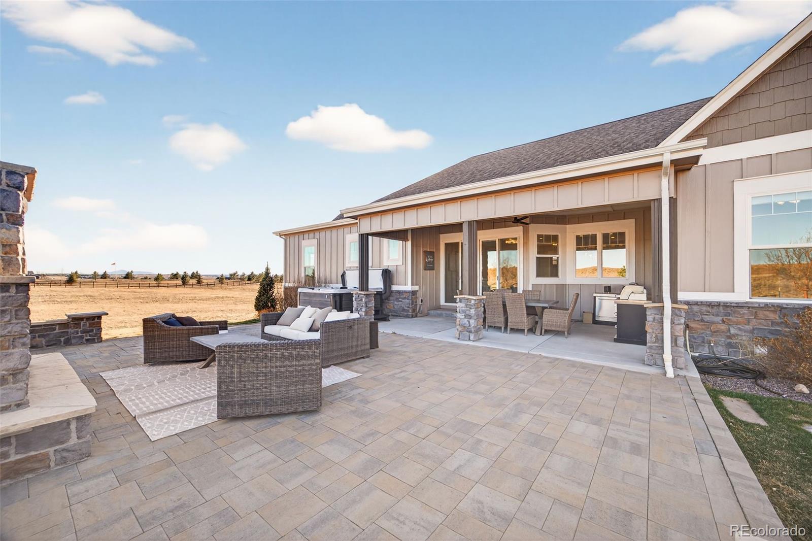3444 Antelope Ridge Trail Parker, CO 80138 - Photo 38 of 50 a view of a patio with couches and potted plants