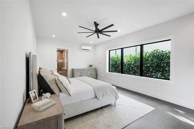 a bathroom with a sink toilet tub and shower