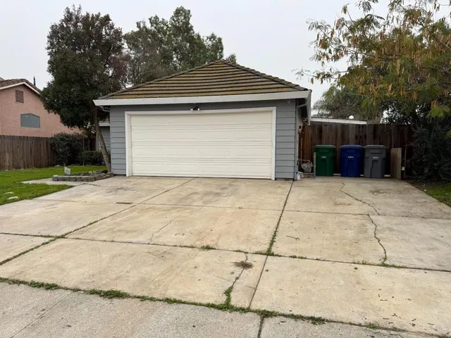 a front view of a house with a garage