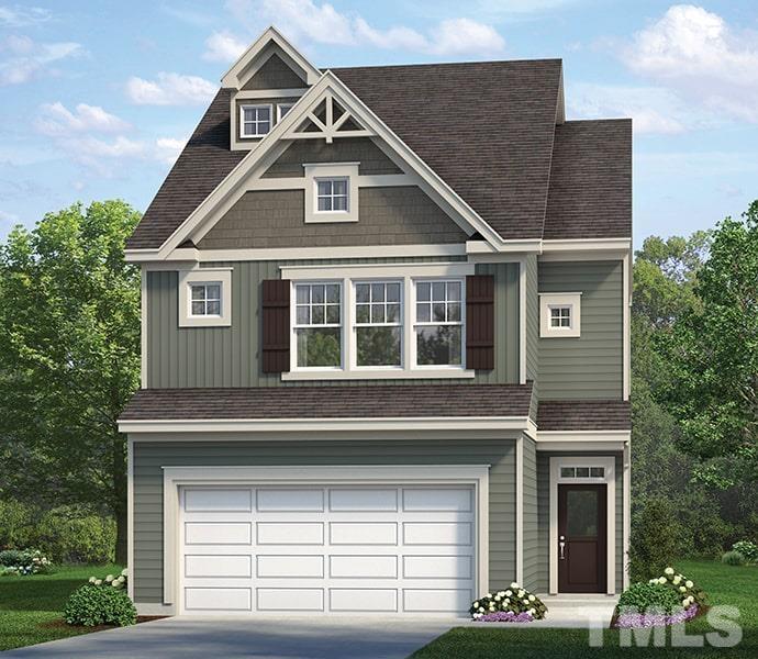 234 Shingle Oak Road Wake Forest, NC 27587 - Photo 2 of 6 a front view of a house with a garage